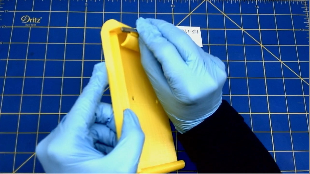 Slide the clip into the hole