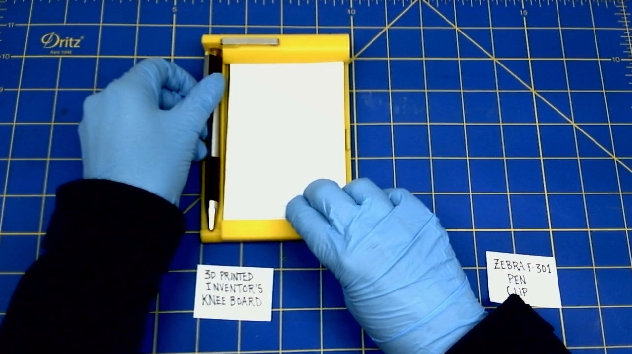 Click the bottom of the pen into the holder 