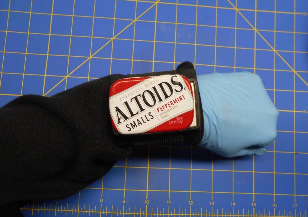 Place the Altoids Smalls Tin on the Magnet Holder